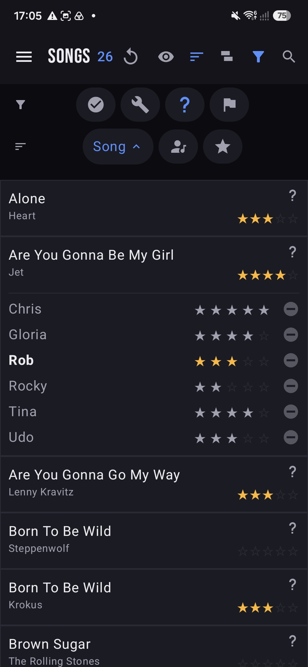 A song expanded to show each member's star rating